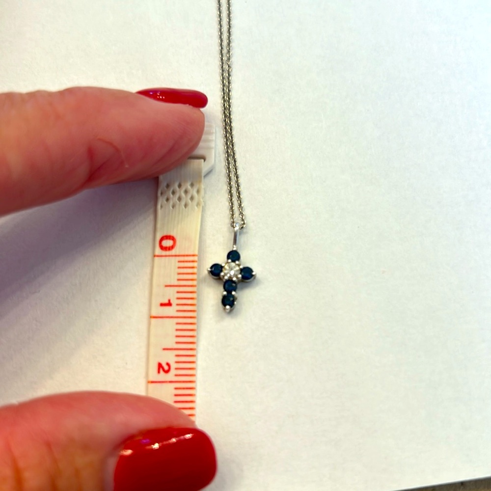 Sapphire and diamond cross pendant with white gold chain
